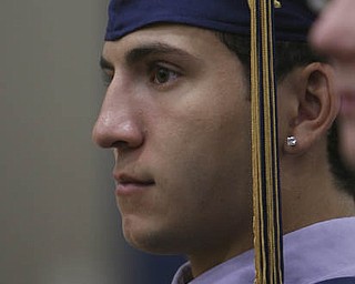 ROBERT K. YOSAY | THE VINDICATOR...Jim Perry listens intently to the Valedictorians = at Lowellville High School gym - the glass of 2010 - graduated Sunday afternoon-30