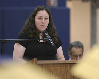 ROBERT K. YOSAY | THE VINDICATOR..Speaker and the class of 2000 is Dr Charlene Arendas former graduate and now a vet in Howland tells the class where her diploma has taken her so far at Lowellville High School gym - the glass of 2010 - graduated Sunday afternoon-30