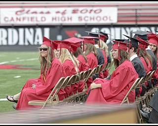 LESLIE CUSANO | THE VINDICATOR.Canfield graduates listen to the Canfield High School choir sing "A Closing Prayer" by Don Besig.