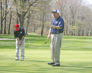 ROBERT K. YOSAY | THE VINDICATOR..Mill Creek Golf Course with Dennis Miller golf Director ( blue hat ) and Andy Santor head professional in the red hat -30-