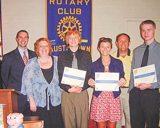 Austintown Rotary Club awarded William Courtney Memorial Scholarships to three Interact Club students at the June 7 meeting. Among those involved in the awards ceremony are above, from left, Brian Laraway, club president; Shelli Trasp and her son Devlin Geroski, who will attend Hiram University; April Krempasky, who will study event and hospitality management in Florida; Gary Reel, who presented the awards; and Eric Crawford, who collected 1,800 items for Interact Club’s food drive and will attend Ohio State University.