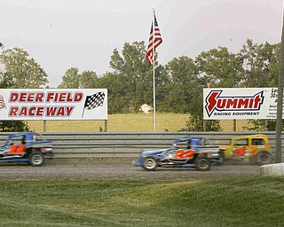 ROBERT K. YOSAY | THE VINDICATOR..Running fast and wheel to wheel drivers jockey for position at Deerfield Raceway on the outskirts of Deerfield on State Route 224 .-30-