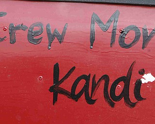 ROBERT K. YOSAY | THE VINDICATOR..A salute to the CREW MOM  "Kandi"  hand painted on the side of a racer -30-