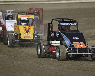 ROBERT K. YOSAY | THE VINDICATOR..Jockeying for positions as the Jr Sprints race at Deerfield Raceway on the outskirts of Deerfield on State Route 224 h.-30-