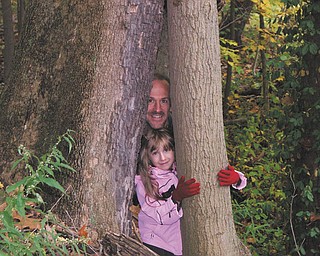 Rob McKenna of Girard and his 7-year-old daughter, Angela, enjoyed an outing at Liberty Park.
