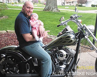 Everyone wondered if the birth of his daughter, Alicen Ruby, on Jan. 1 would change Harley lover Adam Hromyak of Boardman. According to his wife, Lori, the answer is "NO!"