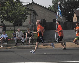 Michael Sweeney of Boardman, father of McKenna, 5, ran in the Memorial Mile on Memorial Day 2010.