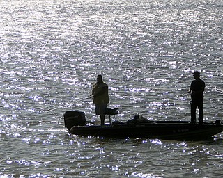 ROBERT K. YOSAY | THE VINDICATOR..IN FOCUS .Two anglers ply their luck on Berlin Lake in Berlin Township Berlin Lake is renowned for its excellent walleye fishing and is one of the very few lakes in the area in which natural reproduction of the walleye population occurs. Anglers will also enjoy fishing for the largemouth and smallmouth bass, muskie, crappie and bluegill which abound in the lake. ..-30--