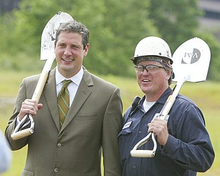 ROBERT K. YOSAY | THE VINDICATOR..Tim ryan  poses with Frank Schubert after the ground breaking of - .V & M and its parent company, Vallourec, will host dignitaries from federal, state, county and local government, along with partners in the business community and more than 100 employees for a groundbreaking ceremony to officially begin construction of the companyÕs new mill..The planned mill Ñ a state-of-the-art, hot-rolling, seamless pipe mill Ñ represents a $650 million investment for Vallourec and will lead to the creation of 750 construction and permanent mill jobs. -30--