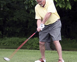 ROBERT K. YOSAY | THE VINDICATOR...Salem Hills GC- Hole #4 Light green Shirt is Ben Broderick- Yellow Shirt Tan shorts Chad Hanysh and Yellow Shirt and Dark Shors is John Clacko -30--