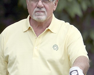 ROBERT K. YOSAY | THE VINDICATOR...Salem Hills GC- Hole #4 Light green Shirt is Ben Broderick- Yellow Shirt Tan shorts Chad Hanysh and Yellow Shirt and Dark Shors is John Clacko -30--