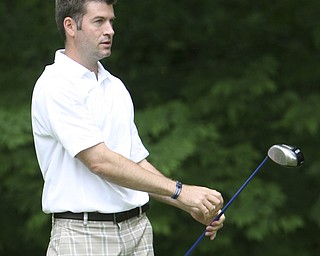 ROBERT K. YOSAY | THE VINDICATOR...Salem Hills GC- Hole #4 Light green Shirt is Ben Broderick- Yellow Shirt Tan shorts Chad Hanysh and Yellow Shirt and Dark Shors is John Clacko -30--