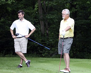 ROBERT K. YOSAY | THE VINDICATOR...Salem Hills GC- Hole #4 Light green Shirt is Ben Broderick- Yellow Shirt Tan shorts Chad Hanysh and Yellow Shirt and Dark Shors is John Clacko -30--