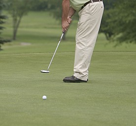 ROBERT K. YOSAY | THE VINDICATOR...Salem Hills GC- Hole #4 Light green Shirt is Ben Broderick- Yellow Shirt Tan shorts Chad Hanysh and Yellow Shirt and Dark Shors is John Clacko -30--