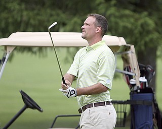 ROBERT K. YOSAY | THE VINDICATOR...Salem Hills GC- Hole #4 Light green Shirt is Ben Broderick- Yellow Shirt Tan shorts Chad Hanysh and Yellow Shirt and Dark Shors is John Clacko -30--