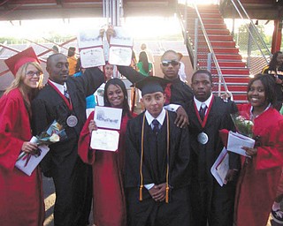 This group of Red Devils are recent graduates of Campbell Memorial High School. They are: Erica Norris, Chris Copeland, Jasmine Polk, Angelo Astorga, Dario Bivens, Reginald Ware and Tasha Harris.