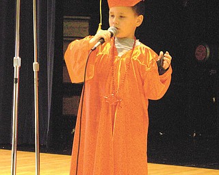 Nicholas McGoogan serenades his family and friends with a song at Campbell Elementary School Preschool.
