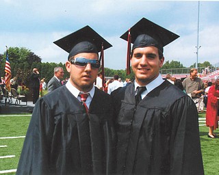 Twins Michael and Frankie Babbaro are shown on graduation day from Canfield High School.