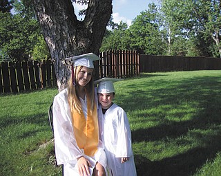 Liz Fowler, who is a 2010 honors graduate from Boardman High School, and her brother, D.J. Rubesichm, who is a preschool graduate of Wee Care Day Care, are both of Boardman.
