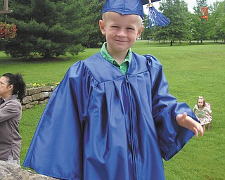 Preston English of Boardmanis shown on his 2010 preschool graduation day.