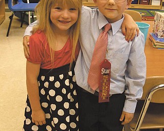 Joshua Colvin and his friend, Alexis Duvall, graduated from kindergarten at Taft Elementary School in Youngstown on June 7.