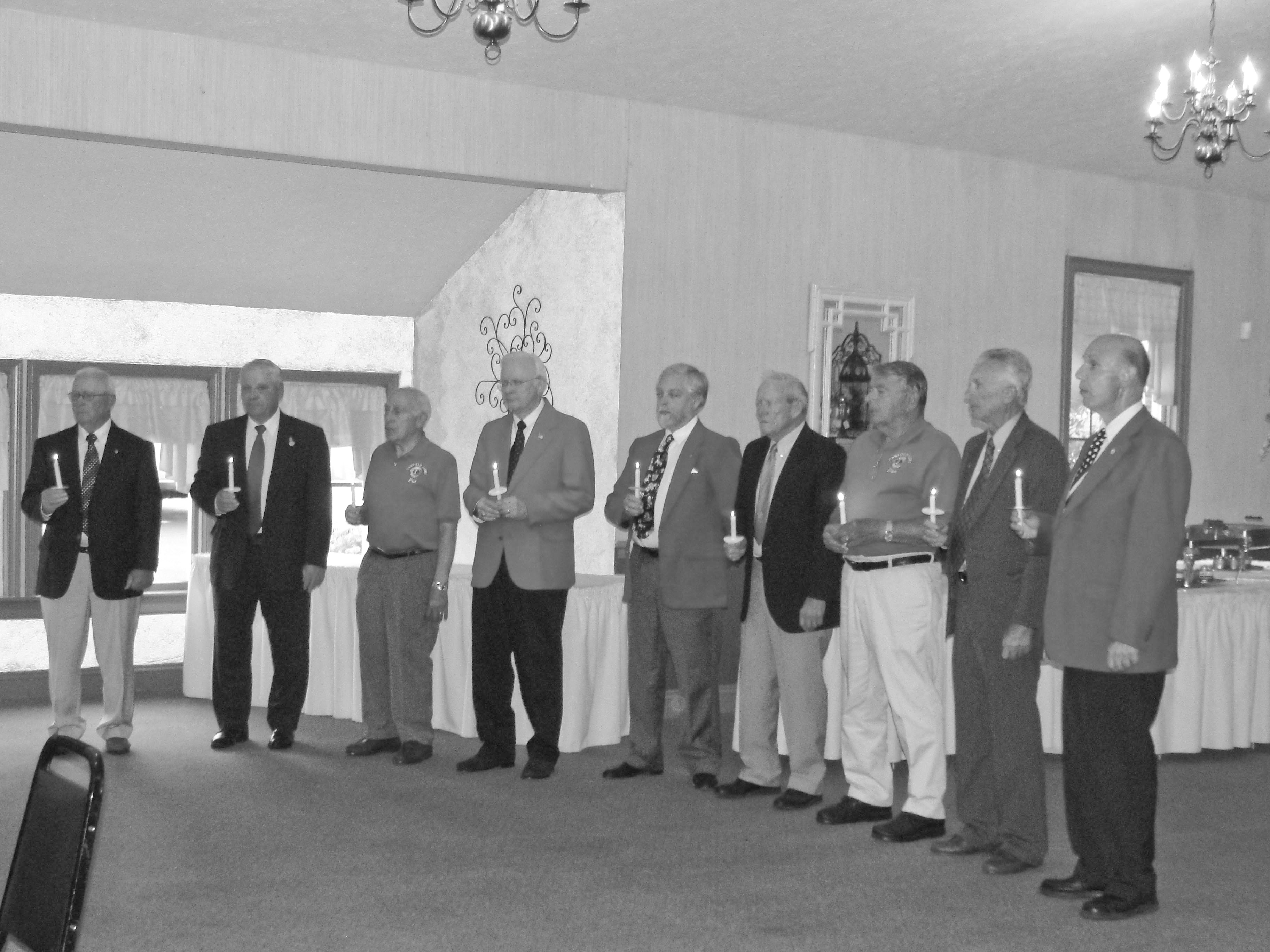The Canfield Lions Club installed officers for its 2010-11 term during a recent candlelight ceremony at A La Cart Catering in Canfield. Ted Filmer, past district governor, served as installing officer for, from left, John Africa, president; Phil Bova, treasurer; Pat D’Agostino, Lion tamer; Tom Zurawick, tail twister; Rich Yager, Jim Duncan, Don Kwolek and Jack Patrick, directors; and Pete Cannell, immediate past president.