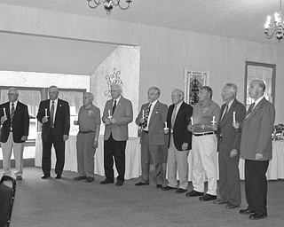 The Canfield Lions Club installed officers for its 2010-11 term during a recent candlelight ceremony at A La Cart Catering in Canfield. Ted Filmer, past district governor, served as installing officer for, from left, John Africa, president; Phil Bova, treasurer; Pat D’Agostino, Lion tamer; Tom Zurawick, tail twister; Rich Yager, Jim Duncan, Don Kwolek and Jack Patrick, directors; and Pete Cannell, immediate past president.