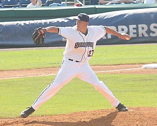 Mike Rayl fires to the plate Sunday afternoon in Niles.