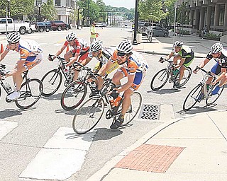 BIKE RACE - Racers taking a turn at 30 mph downtown Youngstown Sunday afternoon. - Special to The Vindicator/Nick Mays