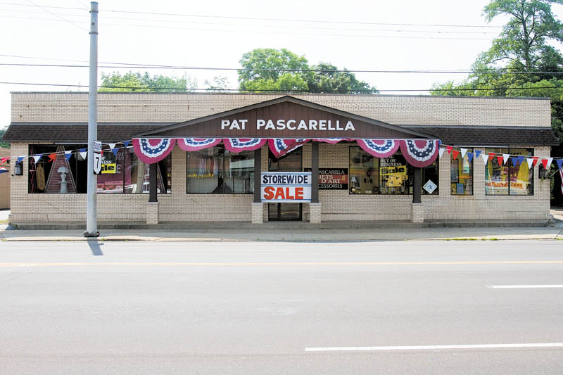Pat Pascarella stands outside his store at 5220 Market St. The store is set to close this month..