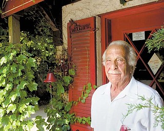 Pat Pascarella stands outside his store at 5220 Market St.