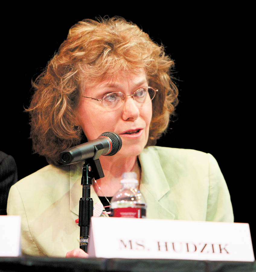 Fighting back tears at times, Mary Ann Hudzik of Warren, a Delphi Corp. salaried retiree, tells a congressional subcommittee in Canfield about the impact of losing her health-care benefits and 41 percent of her company pension. .