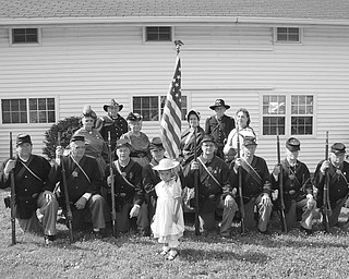 Historical times recreated: The 105th Ohio Volunteer Infantry and Argus Lodge will host the sixth biannual Civil War Reenactment July 24 and 25 at Argus Park, 5050 Shields Road, Canfield. Gates will be open from 10 a.m. to 4:30 p.m. each day, and visitors will have an opportunity to visit camps and talk with the soldiers. Battles are scheduled for 2 p.m. both days. Speakers will portray Gen. Robert E. Lee, Gen. Ulysses S. Grant and President Abraham Lincoln. There will be historical presentations, dress parades, and Gatling gun and live mortar fire demonstrations. Admission is $5 for adults. Children 10 and under are admitted free. Shown wearing authentic Civil War-era clothing are a few of those who will participate in the reenactment.