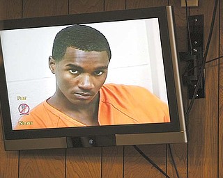 Melvin Shaw, 18, of Idlewood Avenue was video arraigned Wednesday in Youngstown Municipal Court on charges in the murder of Tracee Banks, 17, and attempted murder of Ohio State University football recruit Jamel Turner, 18.