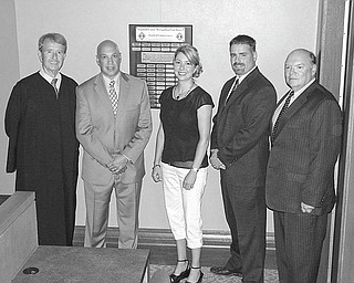 Expression of appreciation: Trumbull County MetroParks, in conjunction with Trumbull County Probate Court Judge Thomas A. Swift, announce that a plaque has been installed at Trumbull County Courthouse to commemorate and thank all past, present and future park board commissioners and probate judges. Among those involved in the placing of the plaque on the first floor in the Trumbull probate courtroom are, from left, Judge Swift and Steve Sava, Beth Kane, John Picuri and John Brown Jr., park commissioners, Not present for the event was Mike Wilson. The park board commissioners are appointed by the probate judge for Trumbull County to staggered three-year terms. The mission of Trumbull County MetroParks is to conserve, manage, protect and promote the county’s natural resources for the benefit of the public’s recreational needs, environmental education, awareness, health and enjoyment. For more information call Zachary Svette, project coordinator, at 330-675-3072 or visit www.trumbullmetroparks.org.