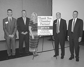 Expert panelists: Nearly 300 attended a recent panel discussion presented by Youngstown/Warren Regional Chamber at Mr. Anthony’s in Boardman, where industry experts translated the practical business implications of the Health Care Reform law. Explaining the insurance, tax and legal ramifications and how it will affect companies were panelists, from left, John Cooper, vice president of sales for Anthem Blue Cross and Blue Shield; Scott Misischia, director of Northeast Ohio sales for Anthem; James Rosa, principal at Hill, Barth & King; and Alan Wenger, partner at Harrington, Hoppe & Mitchell. The men are pictured with Nancy Kuzenko, account executive for Anthem.