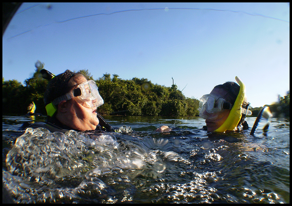 Geoffrey Hauschild|The VIndicator.Michele Ambrosia, of Edinburg, and Aimee Campbell, of Union Twp., in Fox Quarry a lake created from an old limestone quarry B&B Diving in Hillsville PA.