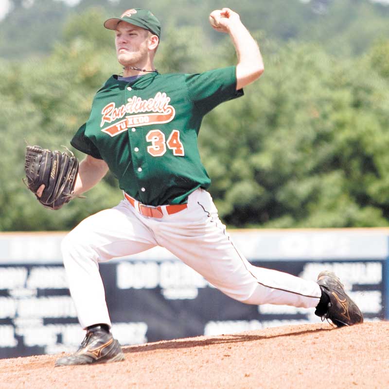 Rondinelli's Nick Ciancci (34) pitches to 1080 Media, at Cene Park, Thursday July 22, 2010