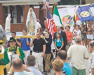 The 12th Annual Procession for the Our Lady of Mount Carmel Italian Festival proceeds down Via Mount Carmel Avenue.