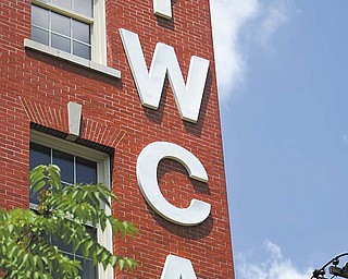 The YWCA showcased the $10 million renovation of its nearly century-old building at 25 W. Rayen Ave., Youngstown, with the first 10 of 30 apartments having been completed there in mid-July. The project also includes renovations to the first floor, which will likely feature an Internet cafŽ, and installation of a new roof.