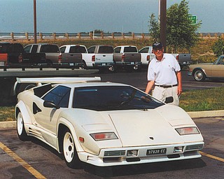 Michael J. Lacivita of Youngstown calls this picture "Wishful Thinking, Grandpa." He's standing next to this Lamborghini at the Nelson Auto Group in Marysville, Ohio. He was vacationing with two grandsons, Jeffrey Vicarel and Patrick Krieger in June 2002.