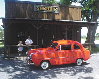 Rick Roman of New Middltown sent this picture of her two sons ,Tyler, 7, and Zachary, 11, with his 1951 Crosley Sedan.