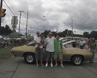 This picture was taken at the Hermitage Father's Day Car Show of Jerret Kolesar, holding his son, Hayden, with Jerry Kolesar (the father and grandfather) and Mark Kolesar, Jerry's other son. In the background is the 1969 Pontiac GTO that Jerry has had since 1969.