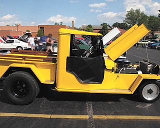 The stats on this Jeep owned by Clarence Stevens of Poland are: yellow 1953 CJ3B Jeep truck Pro Street 2WD, 439cid Chevy, Powerglide, Ford 9"/4 Link. The hand-built body and frame were a combined effort of Clarence, Don and John Stevens.