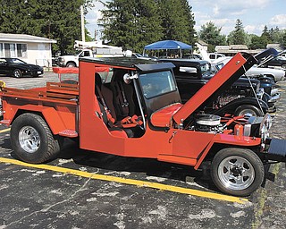 The stats on this Jeep owned by Ron Stevens of Washingtonville: red 1948 CJ2A Jeep Truck Pro Street 2WD, 350cid Chevy Crate Motor 290hp, Turbo 400, Dana 44 w/Detroit Locker. The hand-built body and frame were a combined effort of Clarence, Don and John Stevens.
