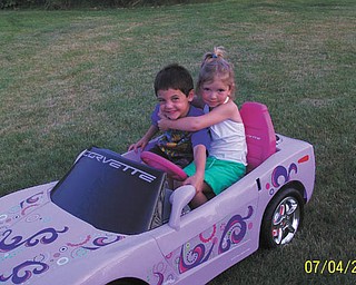 Car enthusiasts sure start young, don't they? This picture of Alivia Horvath, daughter of Rick and Kelley Horvath, and her friend, Haydon Pavlock, son of Arlene and Richard Pavlock, all from New Middletown, was sent by Alivia's great aunt, Marlene Koenig of New Middletown. She said although it's not a real sports car, she thought the picture was too precious to not send. We agree.