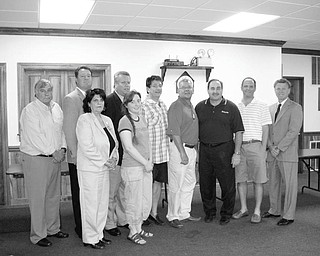Fireworks sponsors recognized: Business members of the community who helped make the July 4th fireworks possible at the Canfield Fairgrounds were thanked for their participation by the Rotary Club of Canfield during a recent luncheon and meeting. Sam Boak, event chairman, presented each with a souvenir of the event, which attracted more than 35,000 spectators. The sponsors in attendance were, from left, Ron Muselli from McHenry Industries; David Coy of WKBN/FOX/WYTV; Carol Harklerode from Lane LifeTRANS; Eric Caspary from Northwood Realty; Megan Christenson from MultiMedia Farms; Boak from Boak & Sons; Tom Danko-Canfield from State Farm Insurance; Frank Paden from Farmers National Bank; Rob DiRusso from DiRusso Sausage; and Thom Russo from WKBN/FOX/WYTV.