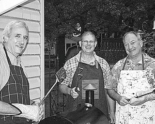 What’s cookin’ in Canfield? Preparing “Meal Deals” that will be served to the public during the upcoming Car Trunk Sale at the Ursuline Center are, from left, Dan Eicher, Mark Curtis and Ray Novotny. The sale will take place from 9 a.m. to 2 p.m. Aug. 14 at the center, 4280 Shields Road, Canfield. Shoppers will find a large selection of bargains being offered by more than 50 people who will sell items from their homes out of the backs of their vehicles. In addition, plants, books and furniture will be for sale in the center auditorium. Proceeds will support Ursuline Center Ministries.