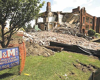Demoliton has begun on the old Jackson-Milton High School, built in 1913. It's on Mahoning Avenue across from Spitzer Chevrolet near state Route 45 in Jackson Township. Crews from M&M Demolition Inc., Vienna, said it should take about a month to complete the job.