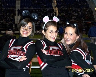 Canfield varsity cheerleaders Marissa Carbon, Adrianna Oddo,, and Ceara Carney “ham it up” with their Halloween faces before the Canfield-Poland rival game!